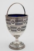 A George III silver swing-handled cream pail, all marks worn, London,
