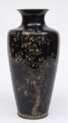 A large Japanese cloisonne vase: of ovoid form decorated with a blossoming tree and birds to a