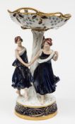 A large Royal Dux Bohemia porcelain centrepiece: modelled with three barefoot girls dancing around
