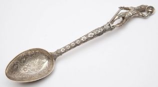 A South American silver spoon: with foliate decorated bowl,