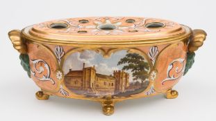 A mid 19th century English porcelain bough pot and cover: of oval form with shell and mask head