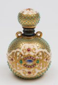 A Coalport porcelain jewelled scent bottle and hinged cover: of globular form with miniature lug