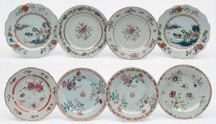 Eight Chinese porcelain famille rose plates: comprising a pair enamelled with peony and other
