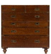 A 19th century oak and brass bound Military chest / writing desk: in two parts,