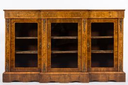 A Victorian walnut, tulipwood crossbanded, marquetry and gilt metal mounted breakfront credenza;,