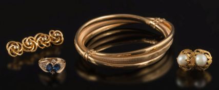 A 9ct gold bangle together with a bar brooch,