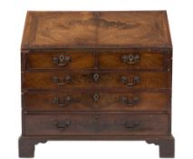 A George III mahogany bureau:,