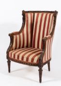 A French carved beech tub-shaped armchair:,