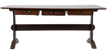 A late 18th / early 19th century oak rectangular side table containing three frieze drawers on