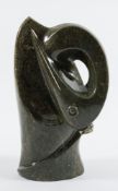 * Cosmos Muchenje (1960- ) a large carved green hardstone study of a bird: with long beak and