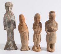 A group of four Chinese pottery standing figures: of three ladies and one man,