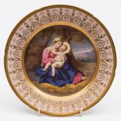 A Coalport porcelain independently decorated plate: the centre finely decorated with the Madonna