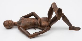 A stained beech artist's lay figure: with articulated limbs, 64cm. high.