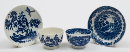 Two Worcester First Period porcelain tea bowls and saucers: one painted in blue with the Birds in