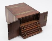 A 19th century mahogany and brass bound collector's cabinet: of rectangular outline,
