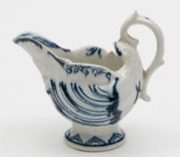 A Derby blue and white dolphin ewer creamboat: moulded and painted with shells and foliage,