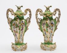 A pair of Coalport porcelain vases and covers: of slender quadrilobed form with gilt foliate