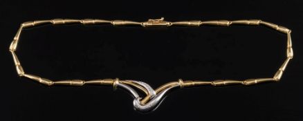 A modern 18ct gold two colour, diamond-set necklace:, 23gms gross weight.