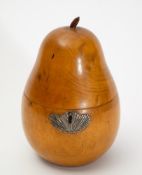 A 19th century fruitwood pear-shaped tea caddy: with silver escutcheon of foliate design 17cm. high.