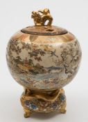 A Satsuma earthenware koro and cover: the inverted gourd shaped body modelled with an encircling