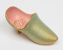 A Coalport porcelain jewelled slipper: with pink interior and gold exterior with overall covering