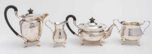 A 20th century matched four-piece silver tea service, maker Walker and Hall, Sheffield,