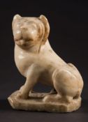 An Indian polychrome decorated carved white marble lion,