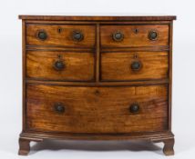 An unusual Regency mahogany and inlaid bow fronted cellarette chest:,