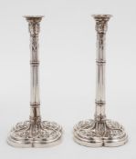 A pair of George III silver candlesticks, maker Thomas Hannam & John Carter, London,