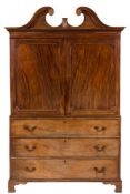 A George III mahogany linen press:,