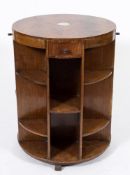 A 1930's mahogany veneered circular revolving bookcase:,