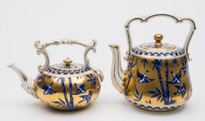 Two Coalport porcelain tea kettles: one of squat form with foliate moulded handle and spout,