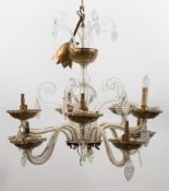 A Venetian clear glass ten branch chandelier: with spiral twist branches,