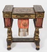 A 19th Century Chinese export lacquer writing and work table:, of shaped outline,
