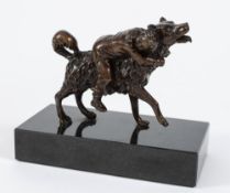 A late 19th century bronze study: of a small boy riding on the back of a dog, unsigned,
