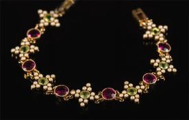 An early 20th century gold, peridot,