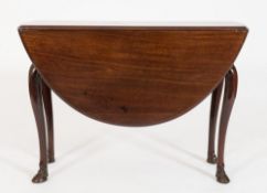 A George II mahogany oval drop flap dining table:, the hinged top with a moulded edge,