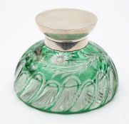 A late Victorian green glass overlaid and silver mounted ink bottle, maker John Grinsell & Sons,