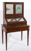 A 19th century French mahogany writing desk on stand: with brass beaded ornament,