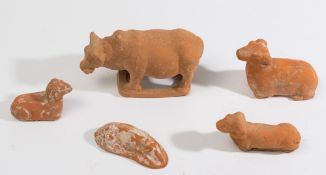 A group of five Chinese terracotta animals: with traces of painted decoration,