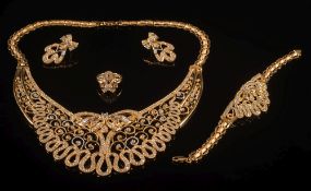 A suite of gem-set jewellery: of scroll open work design comprising a collar necklace,