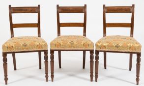 A set of six Regency mahogany and inlaid dining chairs:,
