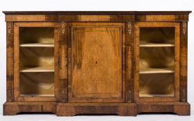 A Victorian walnut, inlaid and gilt metal mounted breakfront low side cabinet:,