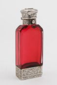 A Victorian cranberry glass combination vinaigrette and scent bottle, maker S.