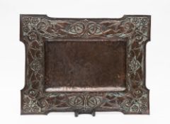 An Arts and Craft period copper tray: of rectangular outline,
