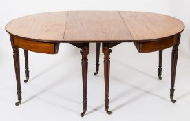 An early 19th century mahogany and inlaid D-end dining table:, the top with a reeded edge,