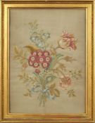 A Regency-style silk embroidered flower picture: worked in blues, pinks, greens and cream silks,