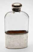 A George V clear glass and silver mounted hip flask, maker George Neal & George Neal, London,