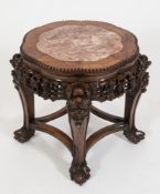 A similar Chinese carved hardwood jardiniere stand:, with a lobed top, 46cm (1ft 6in) diameter),