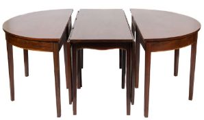 An early 19th Century mahogany and inlaid D end dining table:, in three parts,